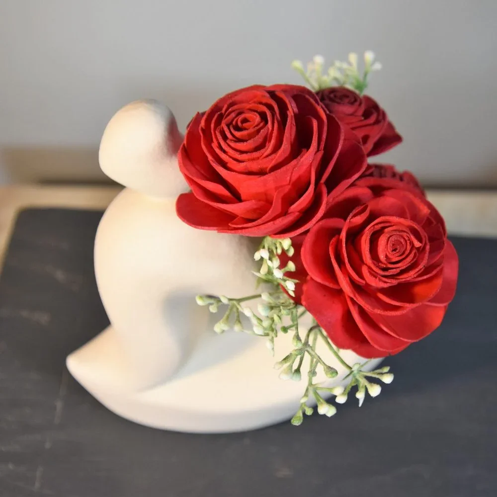 Sexy white curvy hearts vase with 4 red Sola wood roses that will last forever!